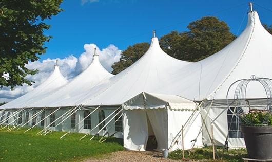 high-quality portable toilets stationed at a wedding, meeting the needs of guests throughout the outdoor reception in New Chicago, IN